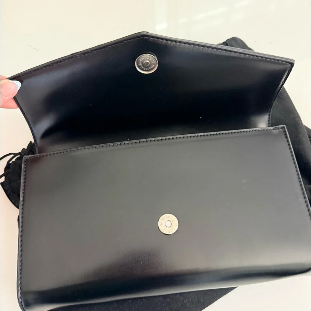 Badgley Mischka Elegant Black Clutch with Silver Accent